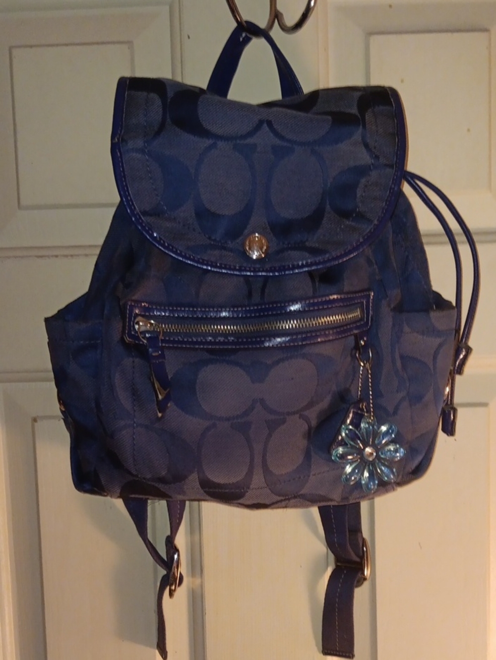 Coach Blue Signature Backpack with Floral Charm